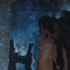 Ce détail d'un dessin de Victor Hugo représente une tour ocre et noire, sur fond de ciel bleu, accolée à deux formes sombres qui semblent se tenir par les bras (ou les manches) (ou les ailes si ce sont deux anges venus chercher Mahomet lors de l'an neuf de l'hégire).
