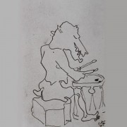 Ce détail d'un dessin de Victor Hugo représente un animal à tête de crocodile, penché sur son tambour, les baguettes en main, en train d'en joue